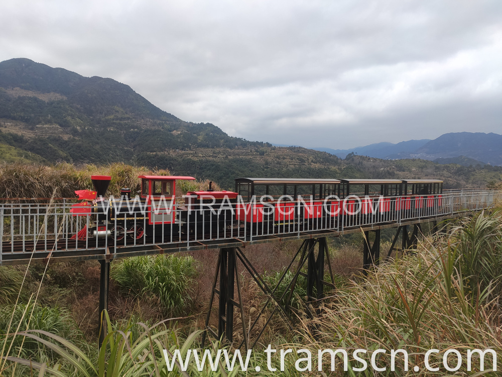 sightseeing train on hill bridge at autumn